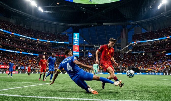 Dramatic Defensive Action in Spain vs Cape Verde 2026 World Cup Clash Spain vs Cape Verde 2026 World Cup match action shot at Mercedes-Benz Stadium with Roberto Pico Lopes making a sliding tackle against a Spanish forward.