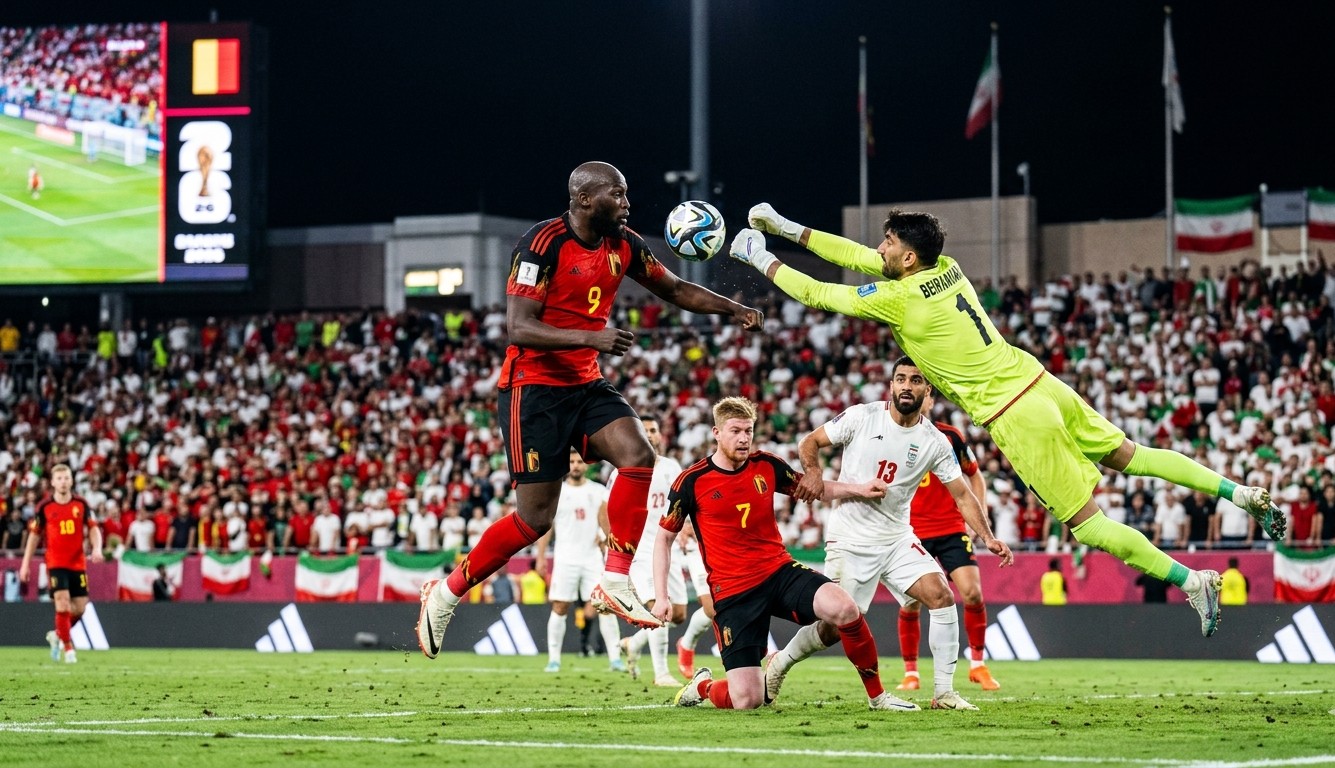Belgium vs Iran World Cup 2026 Match Highlights Belgium striker Romelu Lukaku and Iran goalkeeper Alireza Beiranvand competing for the ball in the air during the FIFA World Cup 2026 match.