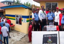 Rivers Police DPO Cultist Scandal: Officers Sacked Over Outrageous Outpost Party Rivers police DPO cultist scandal unfolds as officers pose alongside individuals in cult-associated regalia outside a renovated police post.