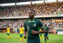France Frustrated as Wonderkid George Ilenikhena Chooses Super Eagles Over U21 George Ilenikhena chooses Super Eagles as the young forward runs on the pitch in a green Nigeria national team kit during a match.