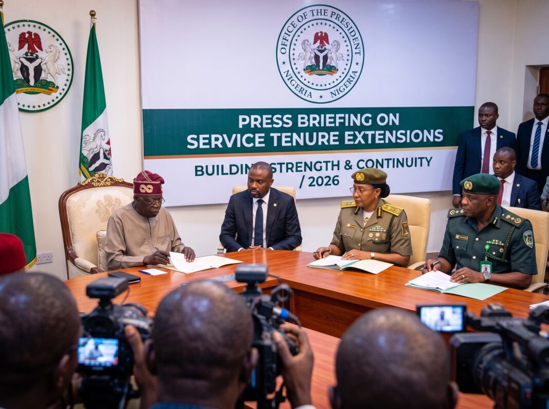 1792532111257 Tinubu extends tenure as the president signs official documents alongside the interior minister and heads of immigration and correctional services.