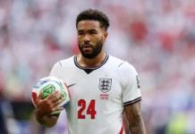 Reece James Knee Surgery: Chelsea Captain Out for 3 Months Following Training Setback Reece James knee surgery news comes as the England defender holds a football on the pitch during an international match.
