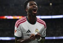 Vinícius Jr. Red Card Chaos Sparks Outrage in Shocking Real Madrid Win : A Real Madrid player shouting passionately in celebration before the match descended into Vinícius Jr. red card chaos.