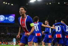 PSG vs Man City 4-2: 1 Historic Masterclass Shatters English Champions PSG captain Marquinhos passionately celebrating a goal with clenched fists, alongside teammates in the background during the match against Manchester City.