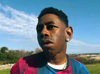 Tyler, The Creator modeling the GOLF WANG Barcelona home kit ahead of the Tyler, The Creator El Clásico.