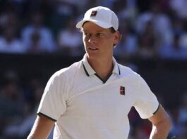 Jannik Sinner Rolex Shanghai Masters Withdrawal: World No. 1 Out as Knee Problem Persists Jannik Sinner wearing a white cap and polo shirt during a tennis match